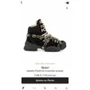 Buy Gucci FlashTrek HighTop velvet trainers online
