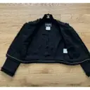 Buy Chanel La Petite Veste Noire wool jacket online