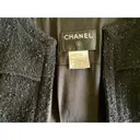 Buy Chanel La Petite Veste Noire wool short vest online