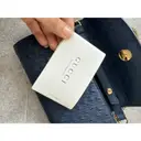 Zumi ostrich clutch bag Gucci