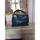 Buy Yves Saint Laurent Muse Two patent leather handbag online
