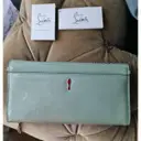 Buy Christian Louboutin Riviera patent leather clutch bag online