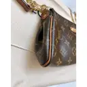 Eva cloth handbag Louis Vuitton
