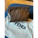 Buy Fendi x Fila FendiMania cloth clutch bag online