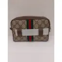 Buy Gucci Ophidia cloth clutch bag online