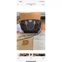 Buy Louis Vuitton Turenne cloth handbag online