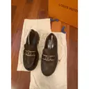 Buy Louis Vuitton Academy leather flats online