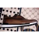 Leather low trainers Berluti