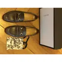 Gucci Brixton leather flats for sale