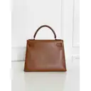 Kelly 28 leather handbag Hermès - Vintage