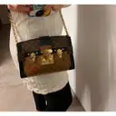 Buy Louis Vuitton Pochette Trunk leather crossbody bag online