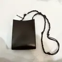 Buy Jil Sander Tangle leather crossbody bag online