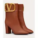 Buy Valentino Garavani V Logo leather ankle boots online