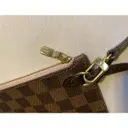 Neverfull linen clutch bag Louis Vuitton