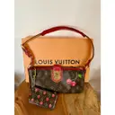 Lizard mini bag Louis Vuitton