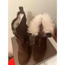 Mongolian lamb ankle boots Gucci