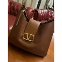 Buy Valentino Garavani Vsling patent leather handbag online
