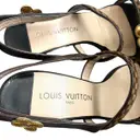 Pony-style calfskin sandals Louis Vuitton
