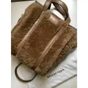 Buy Balenciaga Bazar Bag shearling crossbody bag online