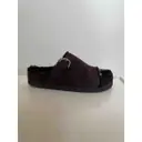 Shearling sandals Co