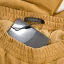 Buy Gestuz Trousers online
