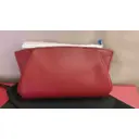 Buy Cartier C leather clutch bag online