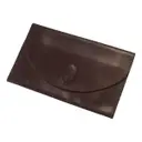 Panthère leather clutch bag Cartier - Vintage