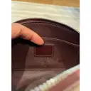 Patent leather clutch Louis Vuitton