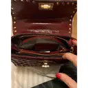 Buy Steve Madden Patent leather handbag online