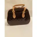 Buy Louis Vuitton Tompkins Square patent leather handbag online