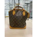Buy Louis Vuitton Lockit Vertical cloth handbag online - Vintage