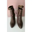 Buy Miu Miu Leather ankle boots online