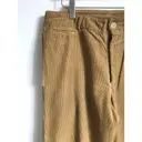 Buy Comme Des Garcons Trousers online
