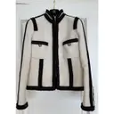Buy Chanel La Petite Veste Noire wool short vest online