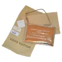 Gold Leather Clutch bag Louis Vuitton