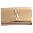 Gold Leather Clutch bag Yves Saint Laurent