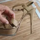 Tribute patent leather sandals Yves Saint Laurent