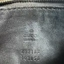 Patent leather clutch bag Gucci