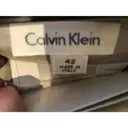Buy Calvin Klein Silk mid-length skirt online