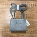 Buy Telfar Small Shopping Bag vegan leather handbag online
