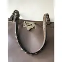Buy Valentino Garavani Demilune leather handbag online