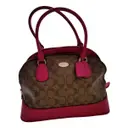 Cartable mini sierra leather handbag Coach