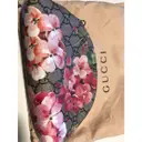 Buy Gucci GG Blooms leather clutch online