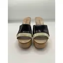 Patent leather mules & clogs Chanel