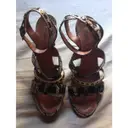 Alaïa Python sandals for sale