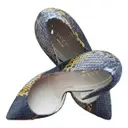 Python heels Gucci