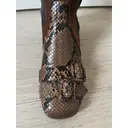Python boots Prada