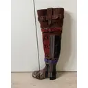 Python boots Prada