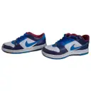 SB Dunk Low patent leather trainers Nike