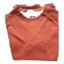 Buy Nike Orange Cotton Knitwear & Sweatshirt online